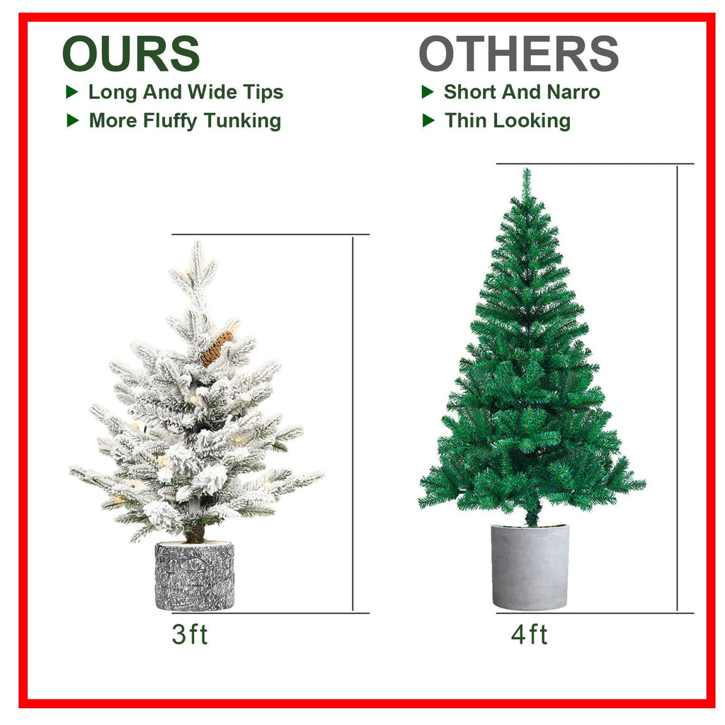 Flocked Christmas tree with potted base and 3 pine cones