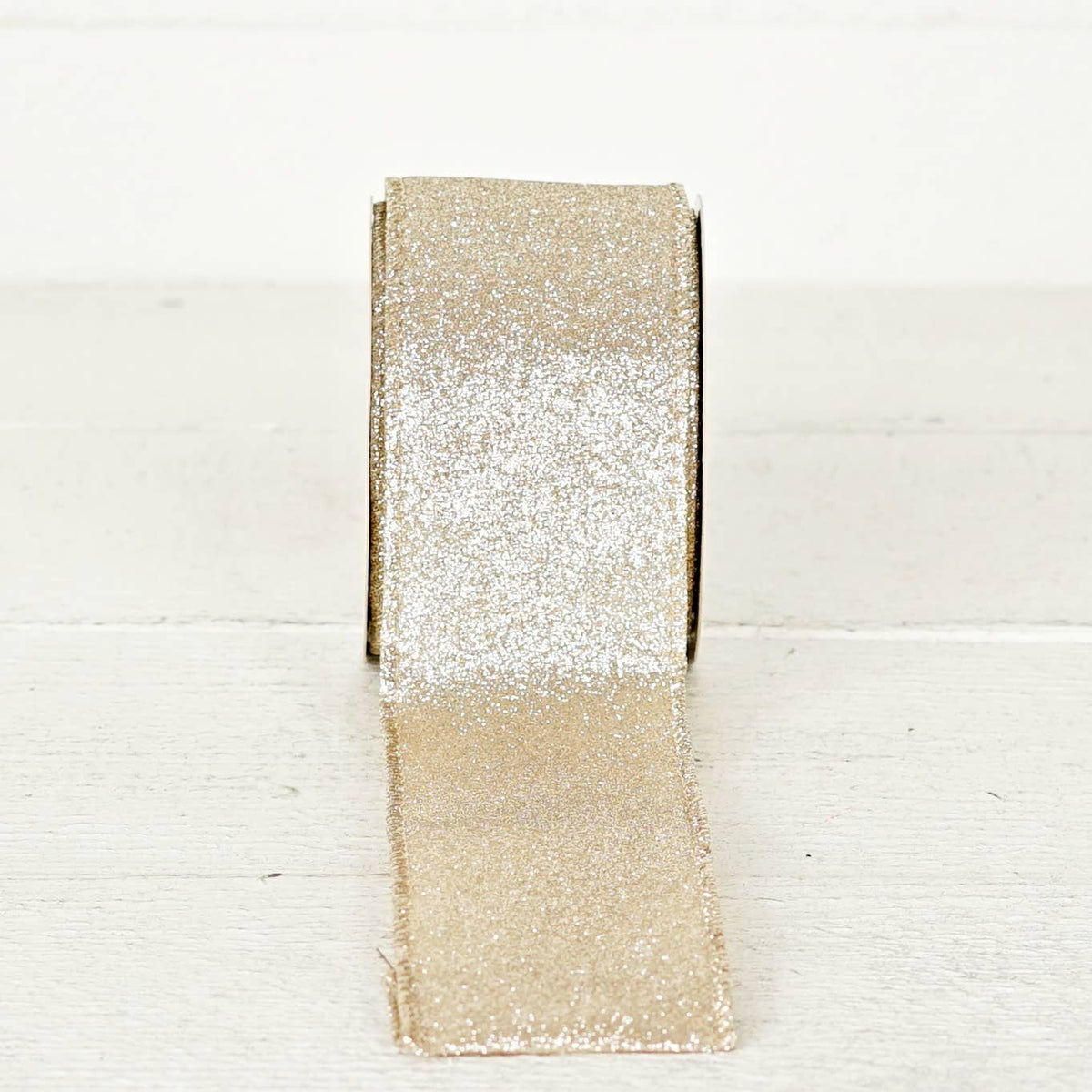 57R0910 - 2.5inWx10Yard Wired Ribbon-Champagne Glitter w. Go