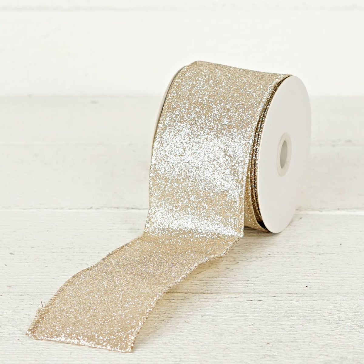 57R0910 - 2.5inWx10Yard Wired Ribbon-Champagne Glitter w. Go